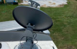 Mounting of a dish receiver on a customers rv so they can pick up tv on the tv we just mounted in their rv.
